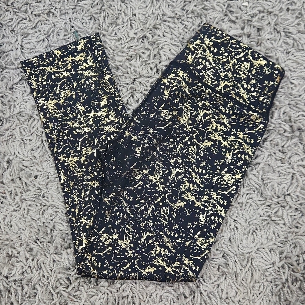 Black and‎ gold zyia leggings. NWOT